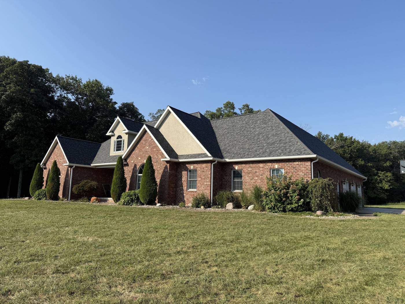 Completed asphalt shingle roof replacement by MPR Roofing on a brick home in Southern Illinois
