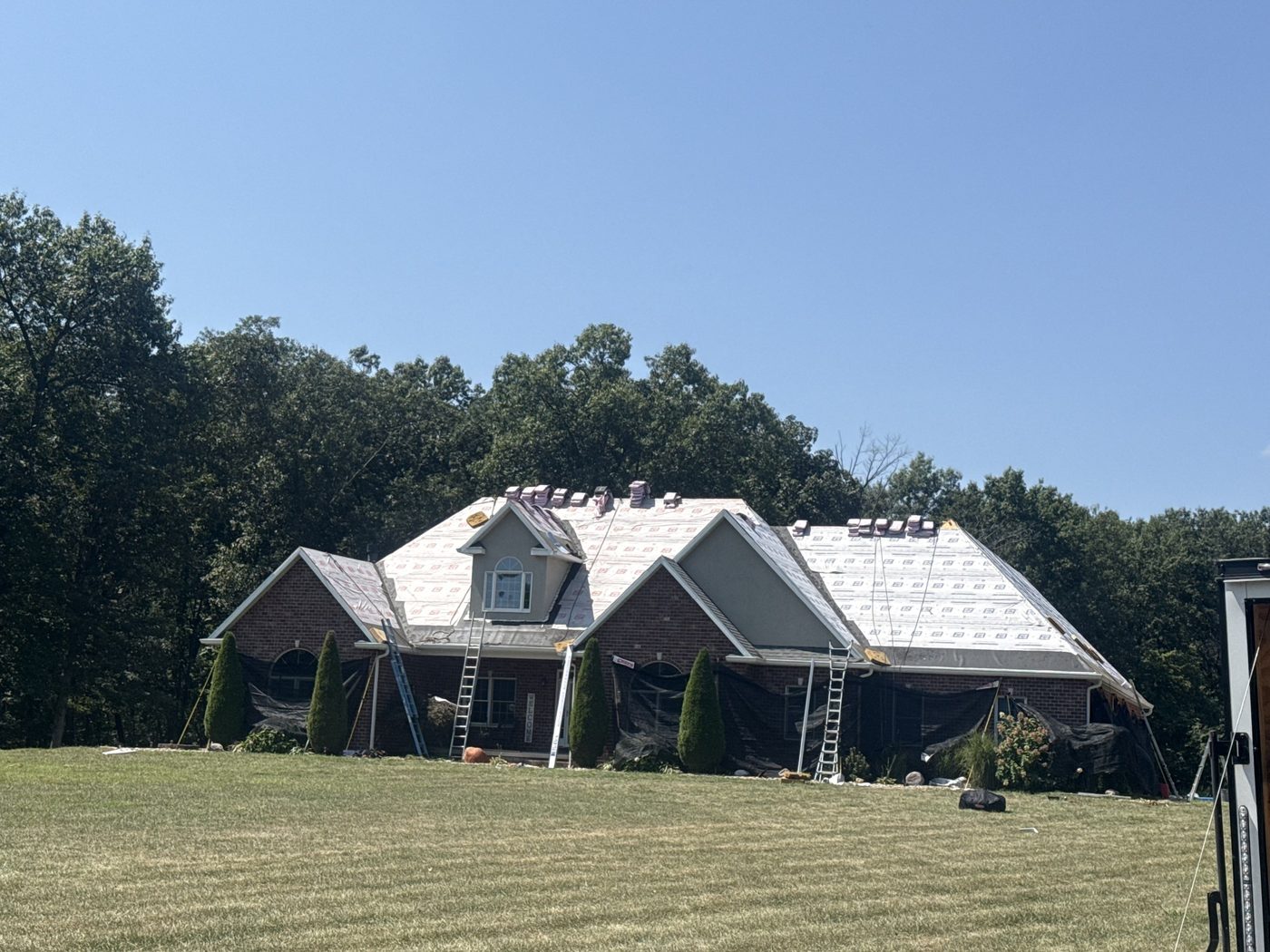 New roof underlayment installed on a brick home during an MPR Roofing roof replacement
